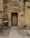 Old House FaÃ§ade with a Wooden Door in Scotland Royalty Free Stock Photo