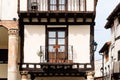 Old house with half-timbered structure and balcony