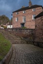 Old house located at the top of a sweeping set of stairs in the Ironbridge Gorge, UK Royalty Free Stock Photo