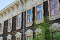 Ancient wood carving on the house in daylight against the blue sky Royalty Free Stock Photo