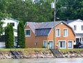 Old house in Montreal area, Canada against blue sky on the waterfront Royalty Free Stock Photo