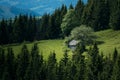 Old house at mountains fields.