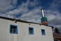 Striped chimney on an old house