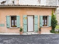 Old house in provence town of manosque with turqoise shutters