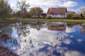 Old house reflected on lake