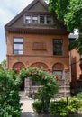 Old house with rose arbor Royalty Free Stock Photo