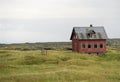 Old house in rugged landscape