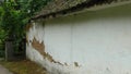 Old house with ruined wall, in a small town in Serbia