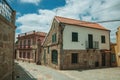 Old house with stone wall on deserted alley Royalty Free Stock Photo