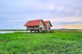 Old house for Views of Panorama Sunset and Sunrise at Thale Noi in Phatthalung, Thailand. Royalty Free Stock Photo
