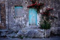 Old house wall and window with flowers Royalty Free Stock Photo