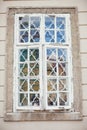 Old house window with white wooden frame Royalty Free Stock Photo