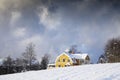 Old house in a winter landscape