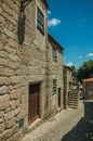 Old house with wooden door and staircase on alley Royalty Free Stock Photo