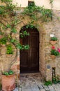 Old house with wooden door in Volterra, tuscany, italy Royalty Free Stock Photo