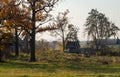 Old houses and an abandoned truck. Autumn at the old farm