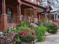 Old houses with bicycles on large porch Royalty Free Stock Photo