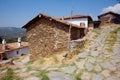 Old houses with brick walls in traditional turkish village with dirt street Royalty Free Stock Photo