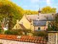 Old houses and chapel of Begijnhof, aka Beguinage, in Bruges, Belgium Royalty Free Stock Photo