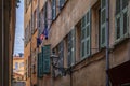 Old houses on a crooked street in Old Town Vieille Ville, Nice, South of France