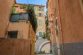 Old houses on a crooked street in Old Town Vieille Ville, Nice, South of France