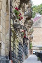 Old houses, Lviv city street, flowers on the balconies.