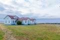 Old houses over lawn in Discovery Park of Seattle, USA Royalty Free Stock Photo