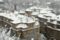 Snowy roofs of old houses in Prague PodolÃÂ­