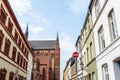 Old houses and St. George church in historic centre of Wismar, Germany