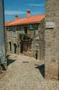 Old houses with stone wall and balcony in Monsanto