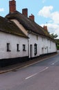 Old houses under thatched roof in the city of Crediton, Devon, United Kingdom June 2, 2018 Royalty Free Stock Photo
