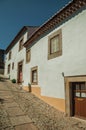 Old houses with whitewashed wall in an alley of Marvao Royalty Free Stock Photo