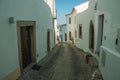 Old houses with whitewashed wall in an alley of Marvao Royalty Free Stock Photo