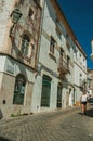 Old houses and woman walking down the street