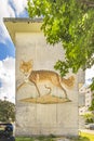 An old housing complex wall in the vicinity of the American Village in Okinawa, where fox and other animals are painted