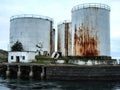 Old huge rusty oil tanks Royalty Free Stock Photo