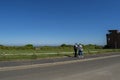 Elderly couple walking hand in hand near the sea. Royalty Free Stock Photo