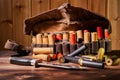 Old hunting cartridges and bandoleer on a wooden table Royalty Free Stock Photo