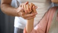 Old husband holding wife hand, spouse care and support, love connection, couple