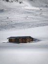 old hut in the snow in the mountains Royalty Free Stock Photo