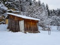 An old hut with a snowy roof Royalty Free Stock Photo