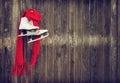 Old ice skates hanging on rustic wooden wall Royalty Free Stock Photo