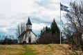 Old Icelandic church and flag Royalty Free Stock Photo