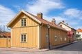 Old idyllic wooden house on a city street