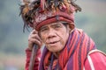 Old ifugao man in national dress next to rice terraces. Ifugao - the people in the Philippines. Royalty Free Stock Photo