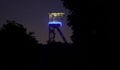Old illuminated coal mine tower in germany Royalty Free Stock Photo