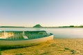 Old image clinker dinghy on beach Royalty Free Stock Photo