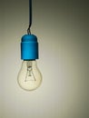 Old incandescent light bulb with bad wiring, sight Royalty Free Stock Photo