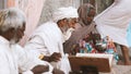 Old indian sadhu reading scriptures