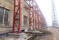 Old industrial building. Abandoned manufacture. Metal constructions